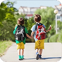 image of kids wearing backpacks.