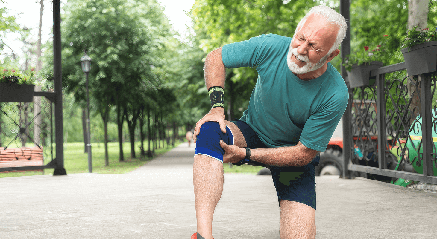 Senior man deals with knee pain