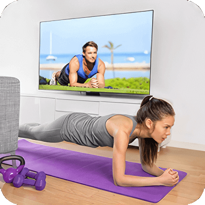 image of woman exercising at home